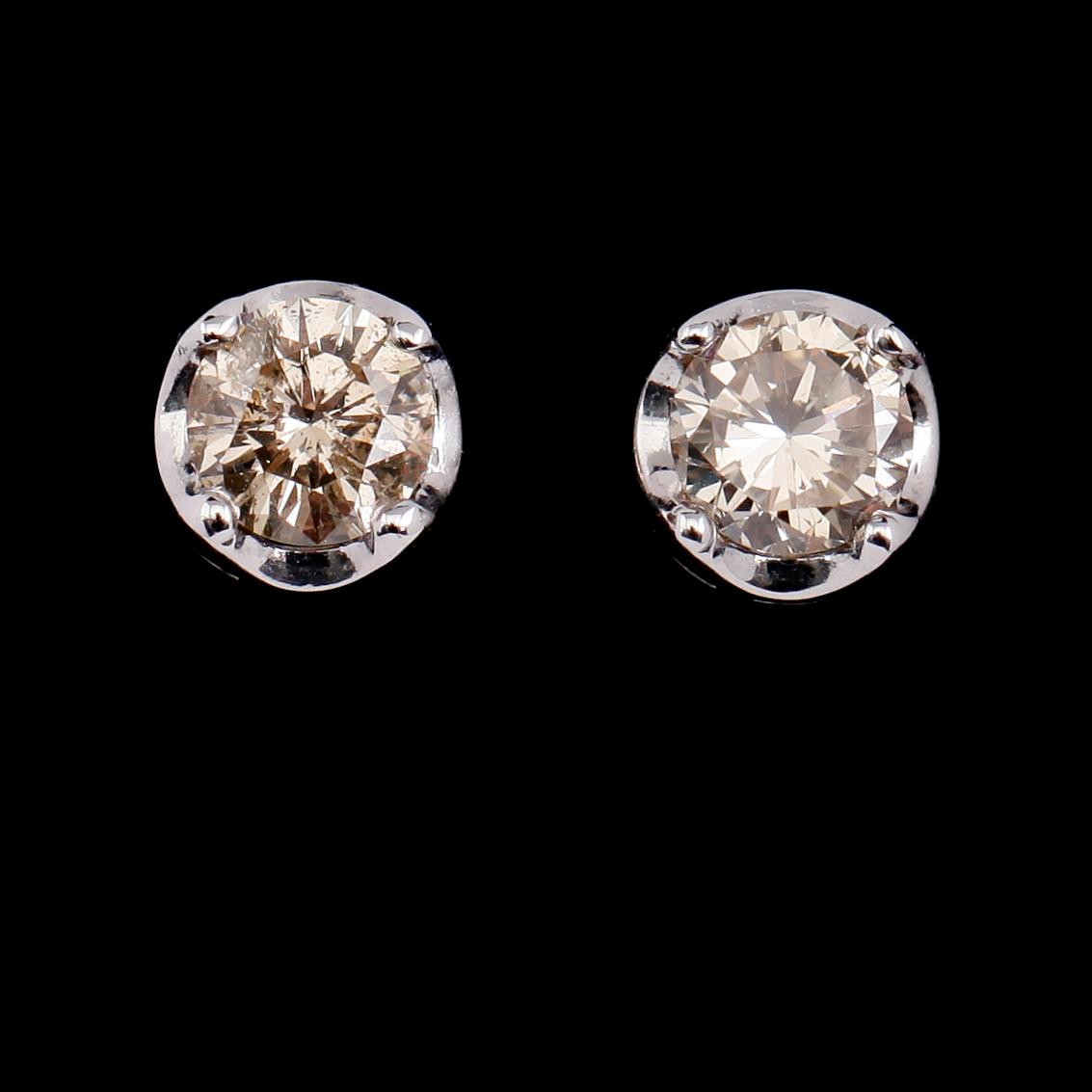 ÖRHÄNGEN, 1 par, 18 k vitguld, solitära briljantslipade diamanter tot ca 1.72 ct.
