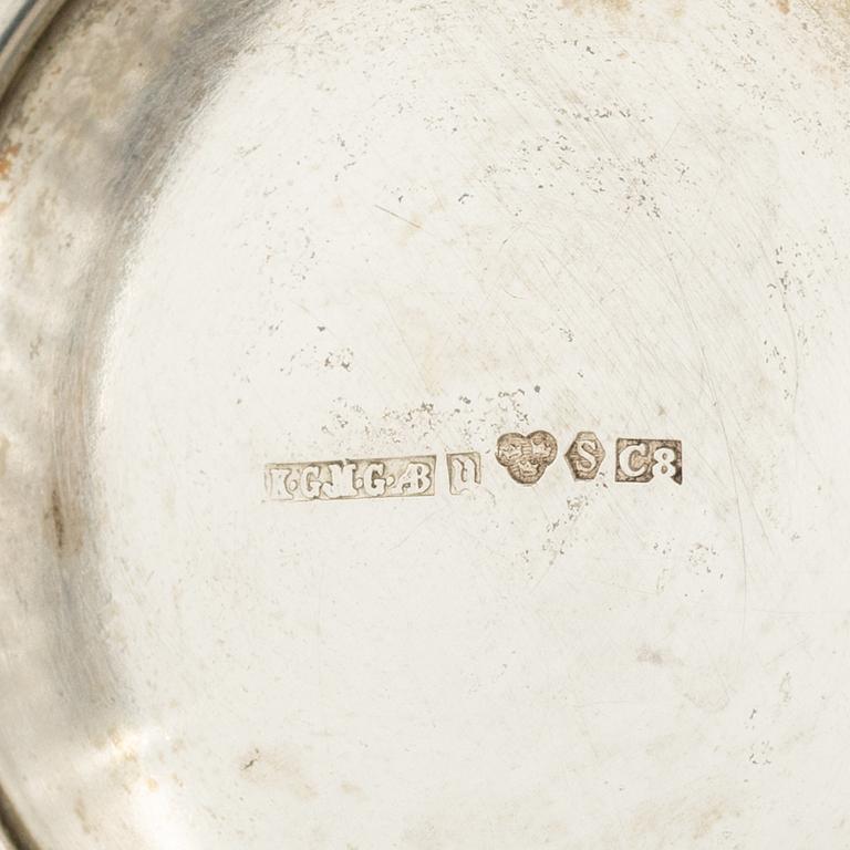 Two silver beakers and a bowl,