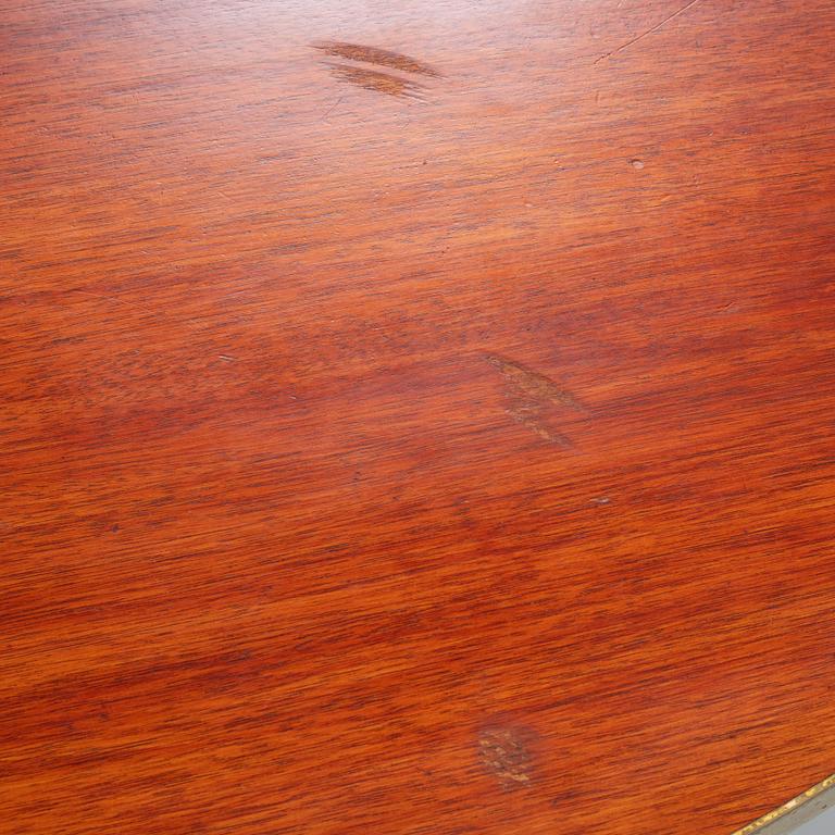 A mid 20th century dining table.