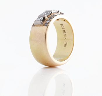 A ca 0.60 - 0.70 cts brilliant and baguette cut diamond ring by Bror Schalin, Östersund.