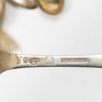 Sixteen silver spoons and seven teaspoons, Sweden, 19th and 20th century.
