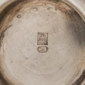 A four-piece silver coffee set, St. Petersburg 1887, original fitted box from Khlebnikov. Sugar tong, Moscow around 190.