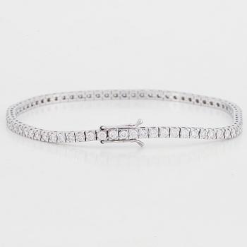 Brilliant cut diamond tennis bracelet.