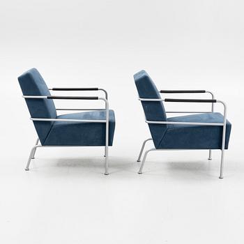 A pair of 'Cinema' easy chairs by Gunilla Allard for Lammhults.