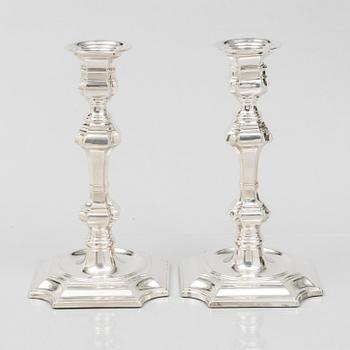 Pedro Duran, a pair of Baroque style sterling silver candle sticks, Spain.