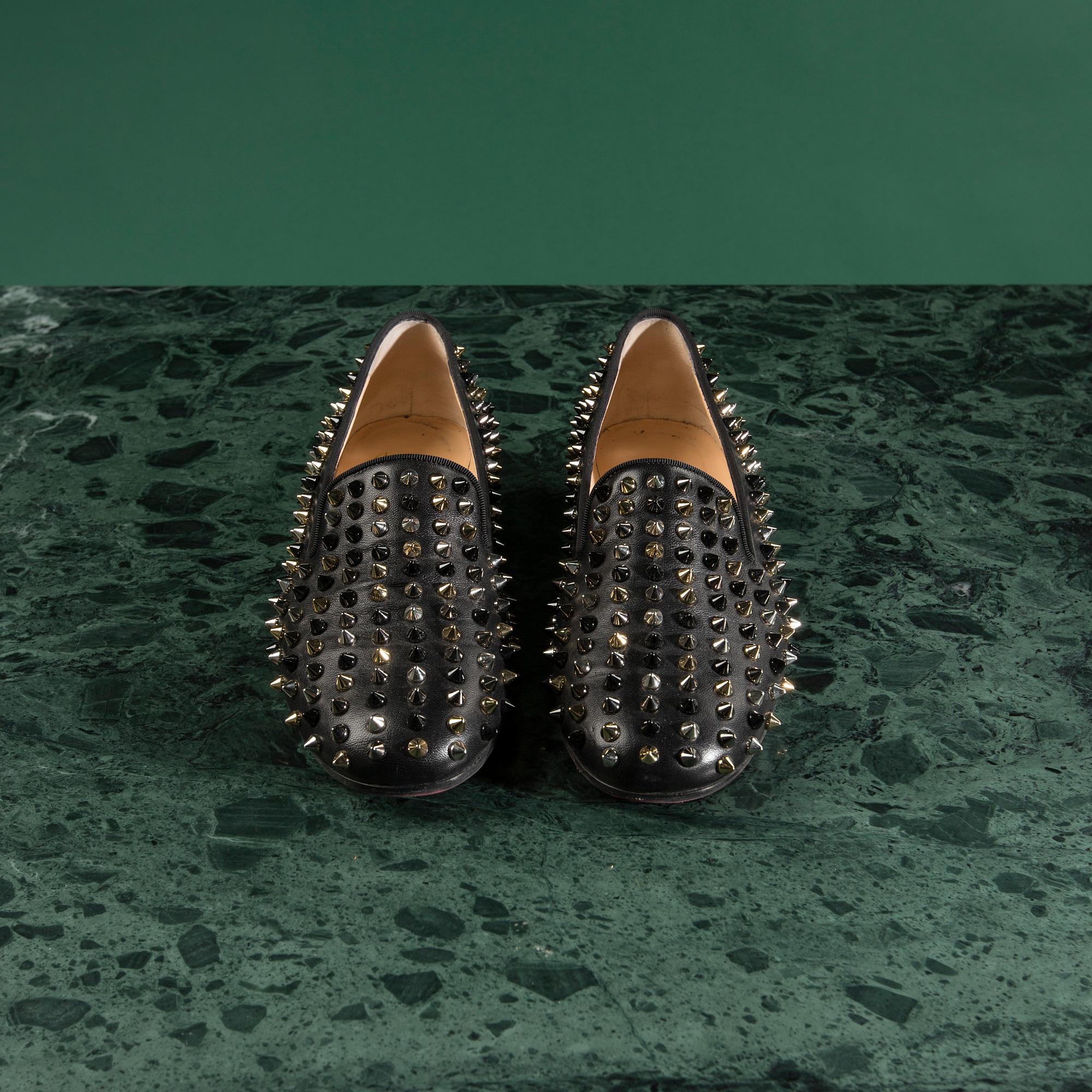 A pair of loafers, "The Rolling Spikes" by CHRISTIAN LOUBOUTIN, in size 38.