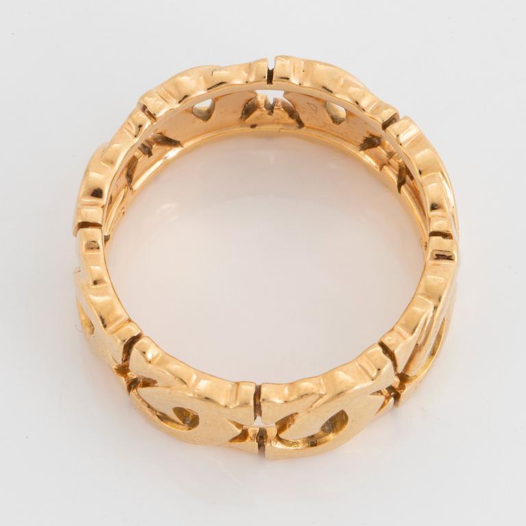 An 18K gold Cartier "Double C" ring.