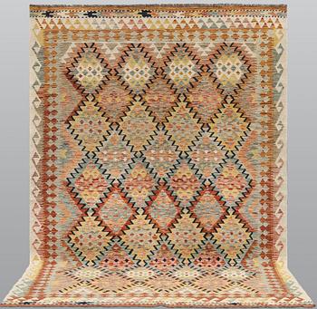 A Kilim rug, c. 249 x 169 cm.