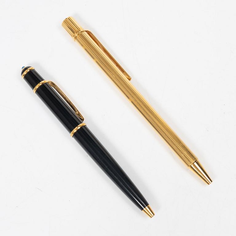 Cartier, Two ballpoint pens, 'must de Cartier' and 'Diabolo de Cartier'.