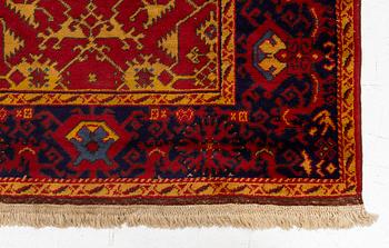 A semi antique Romanian "Lotto" rug, c. 214 x 123 cm.