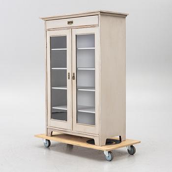 Display cabinet, early 20th century.