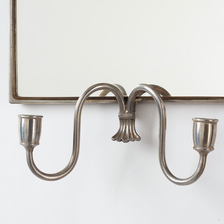 Nils Fougstedt, probably, a pair of pewter and brass framed wall sconces, Svenskt Tenn, Stockholm 1925.