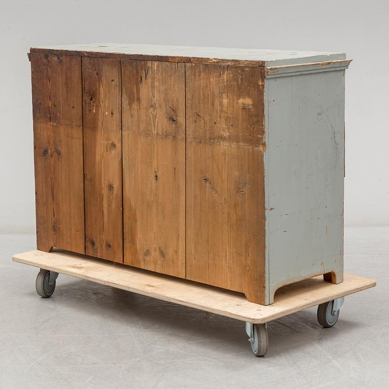 a chest of drawers from the late 19th century.