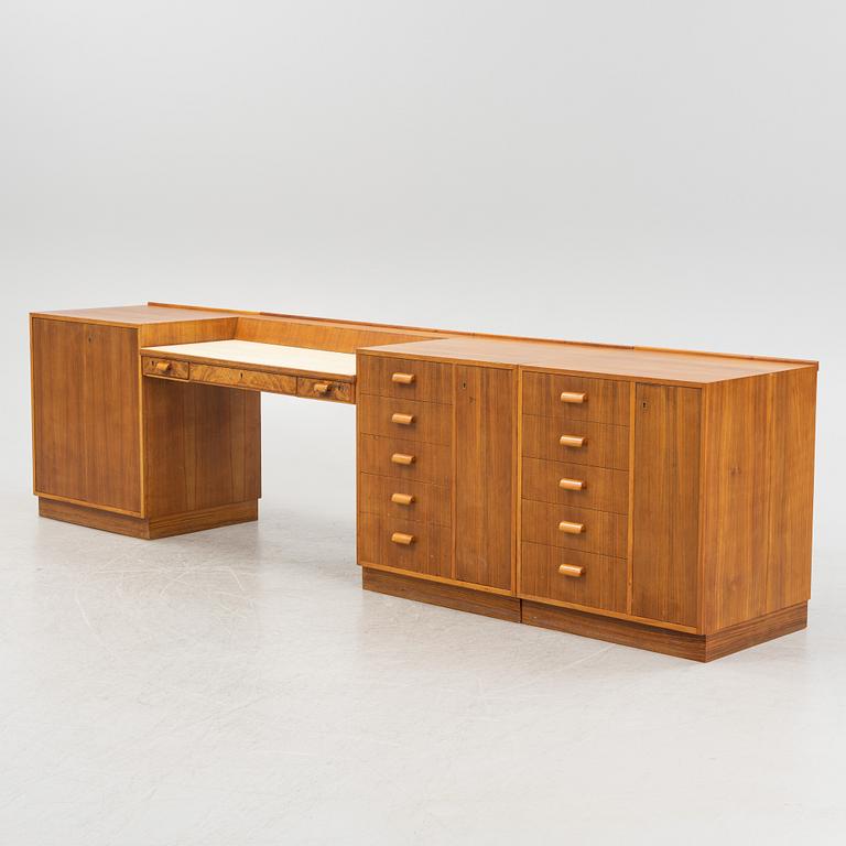 A mahogany, walnut and rosewood veneer set of cabinets with desk, Jönköping Möbelfabriks Aktiebolag. 1950's.