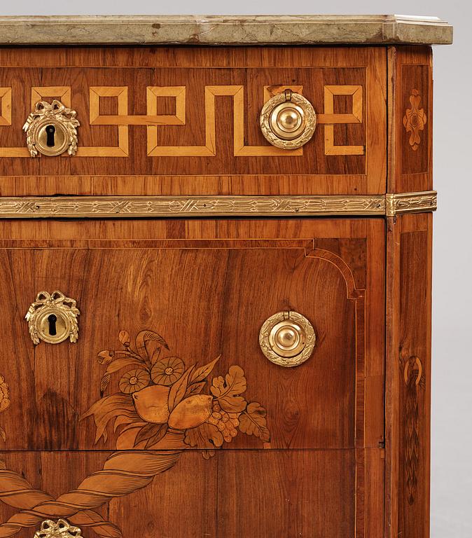 A Gustavian marquetry and gilt brass-mounted commode by G. Foltiern (master in Stockholm 1771-1804), dated 1782.