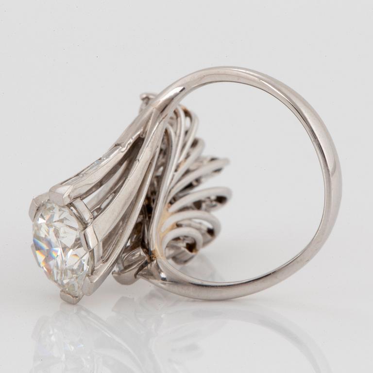 A platinum ring set with an old-cut diamond ca 2.25 cts quality ca I/J si2.