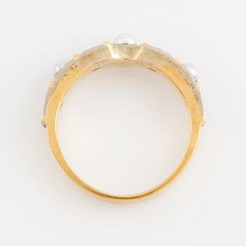 An 18K gold ring set with cultured pearls and round brilliant-cut diamonds.