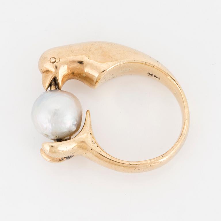 A ring with pearl.