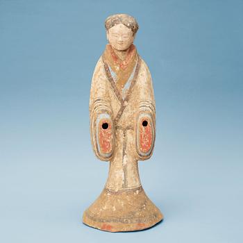 A painted pottery figure of a court attendant, Han Dynasty (206 BC-220 AD).