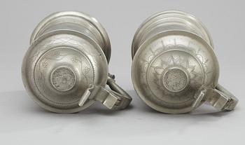 A set of two pewter pints. Makers mark by Gottlob F Bauman, Hudiksvall (1789-1826/31).