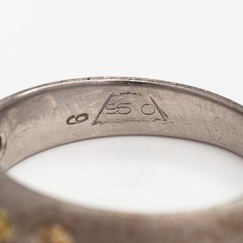 A palladium ring with diamonds ca. 0.25 ct in total.