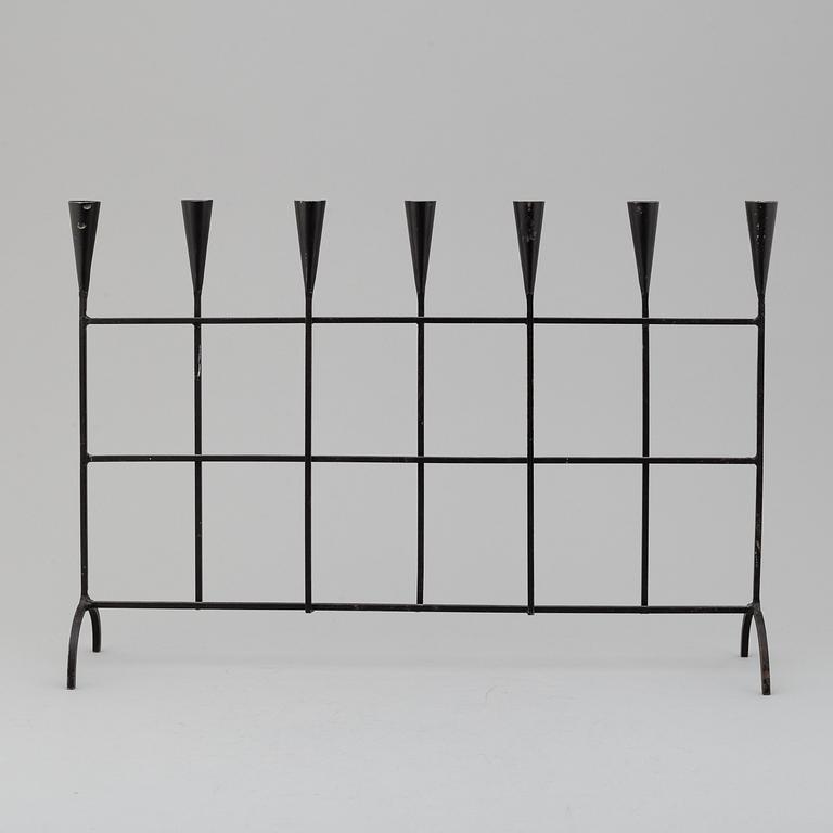 a iron candelabra, 20th century.
