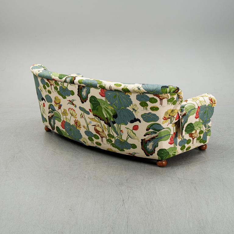 A model 968 sofa by Josef Frank for Firma Svenskt Tenn.