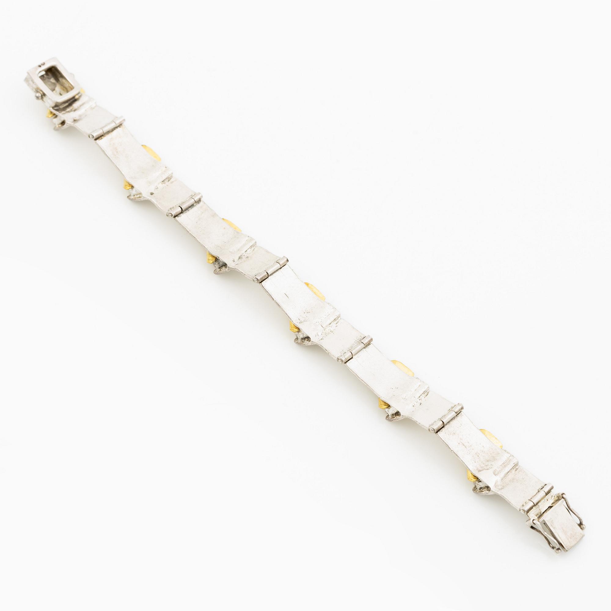 Bracelet silver and gilded silver.