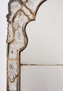 A Northern European late baroque mirror, mid 18th century.