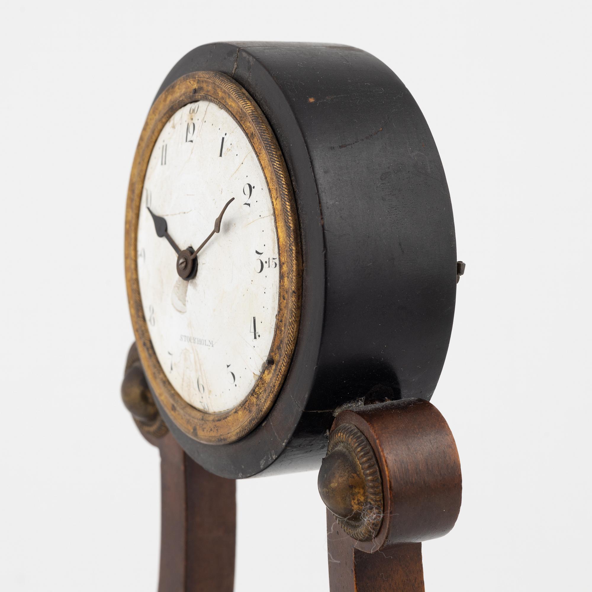 An Empire mantle clock from the 19th century.