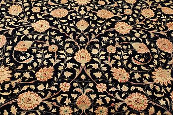 A Kashan carpet, c. 535 x 296 cm.