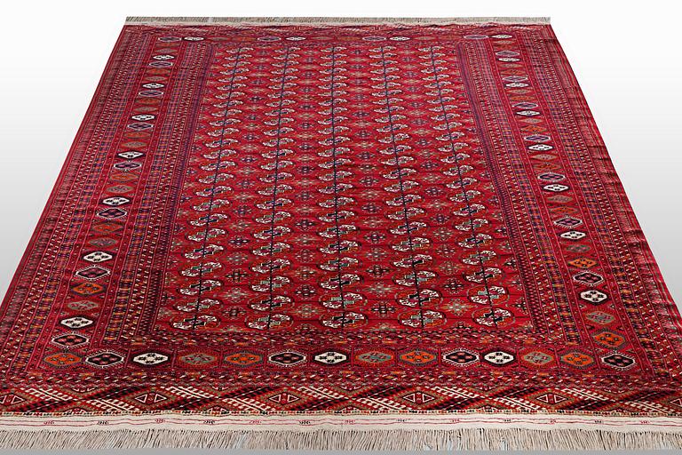 A carpet, semi-antique Tekke, ca 330 x 250 cm.