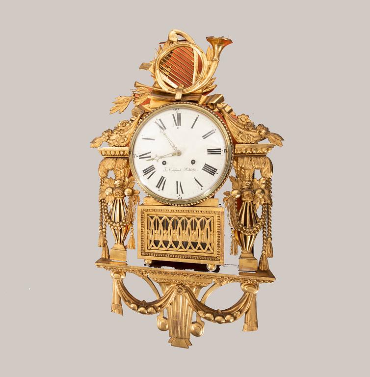 A gilded late Gustavian wall clock first half of the 19th century signed Jonas Cedelund.