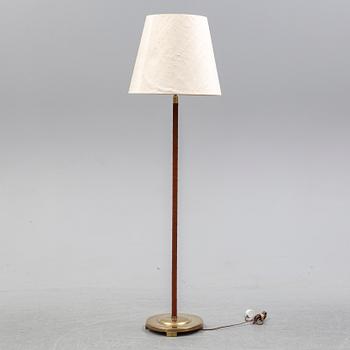 A brass and leather floor lamp model '32753', Nordiska Kompaniet 1940's.