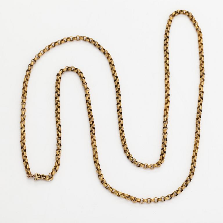 Halsband, 18K guld och syntetisk eller äkta rubin.