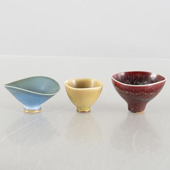 Berndt Friberg, a set of four stoneware miniature vases and three bowls, Gustavsberg Studio.