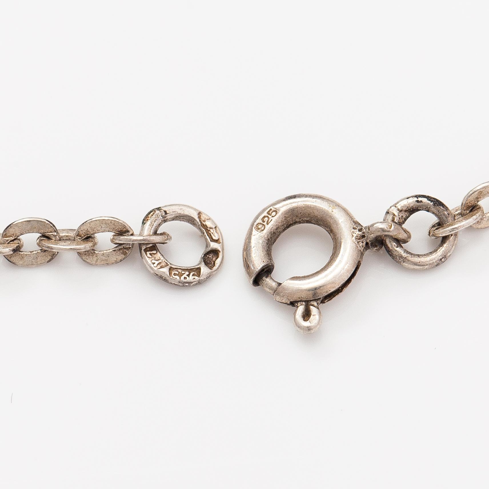 Nanny Still, A sterling silver and titanium necklace. Kultakeskus, Hämeenlinna 1976.