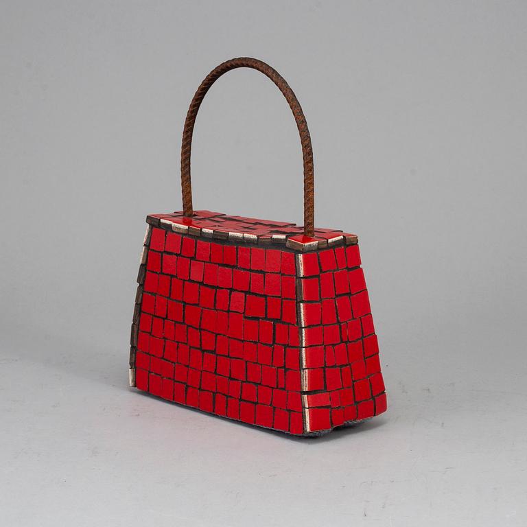 A mosaic sculpture by Marie Hellström.