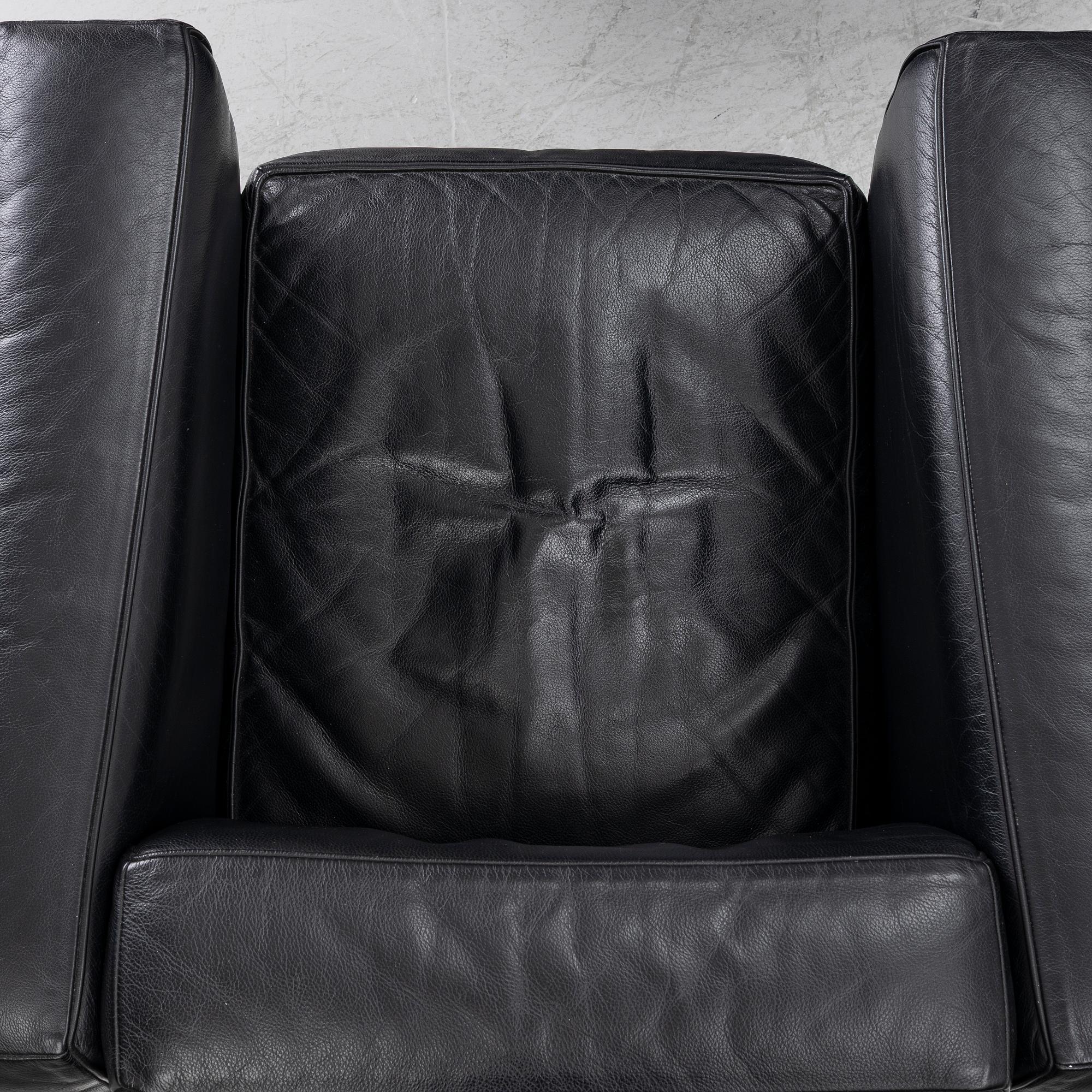 Le Corbusier (Charles-Édouard Jeanneret), Pierre Jeanneret, Charlotte Perriand & Le Corbusier, a pair of 'LC2' armchairs, Cassina.