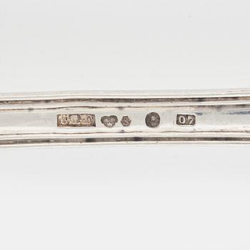 Skedar, 9 st, silver, "Engelsk snäck", olika smeder, mestadels Sverige 1857-1916.