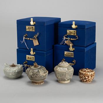 A group of four Swankhalok jars with covers, 16th/17th Century.