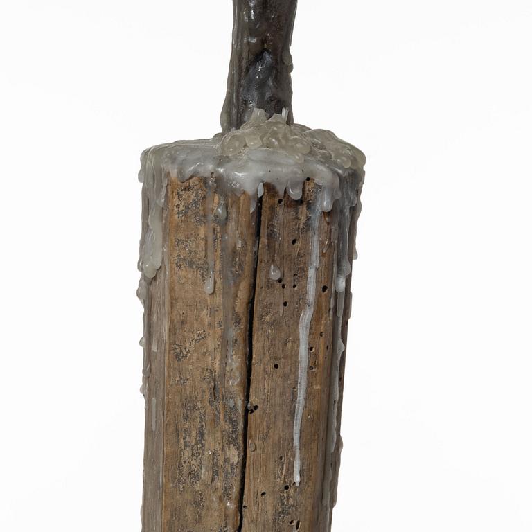 A candle stick, 19th/20th Century.