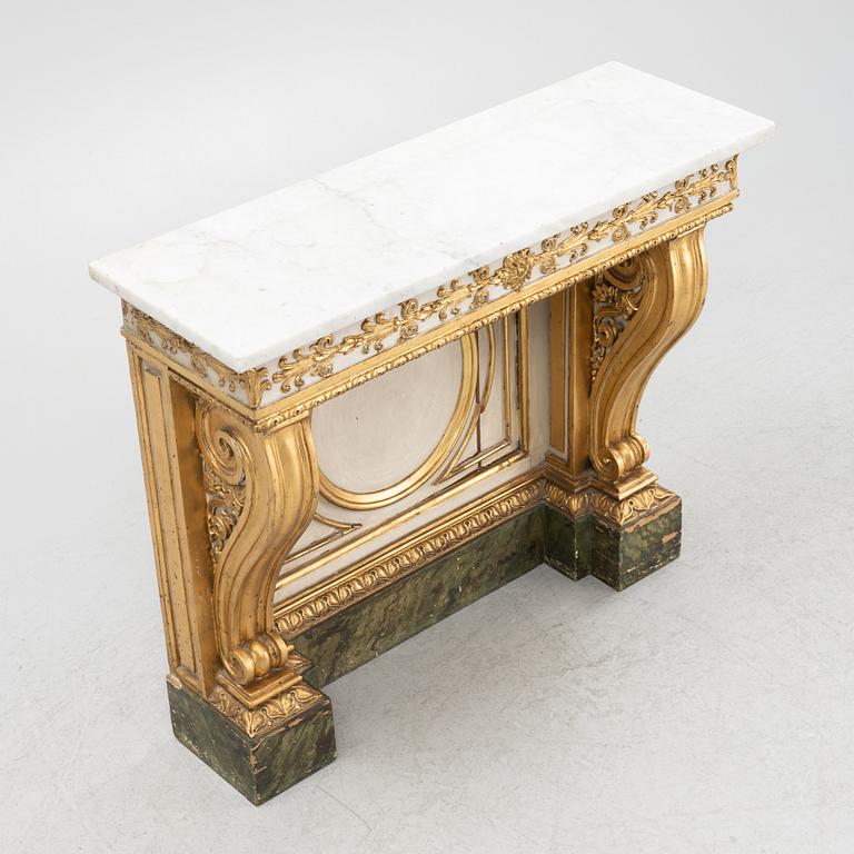 A Swedish late Empire giltwood and marble console, 1830's/40's.