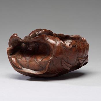 A bamboo carving of a crab and lotus, late Qing dynasty.