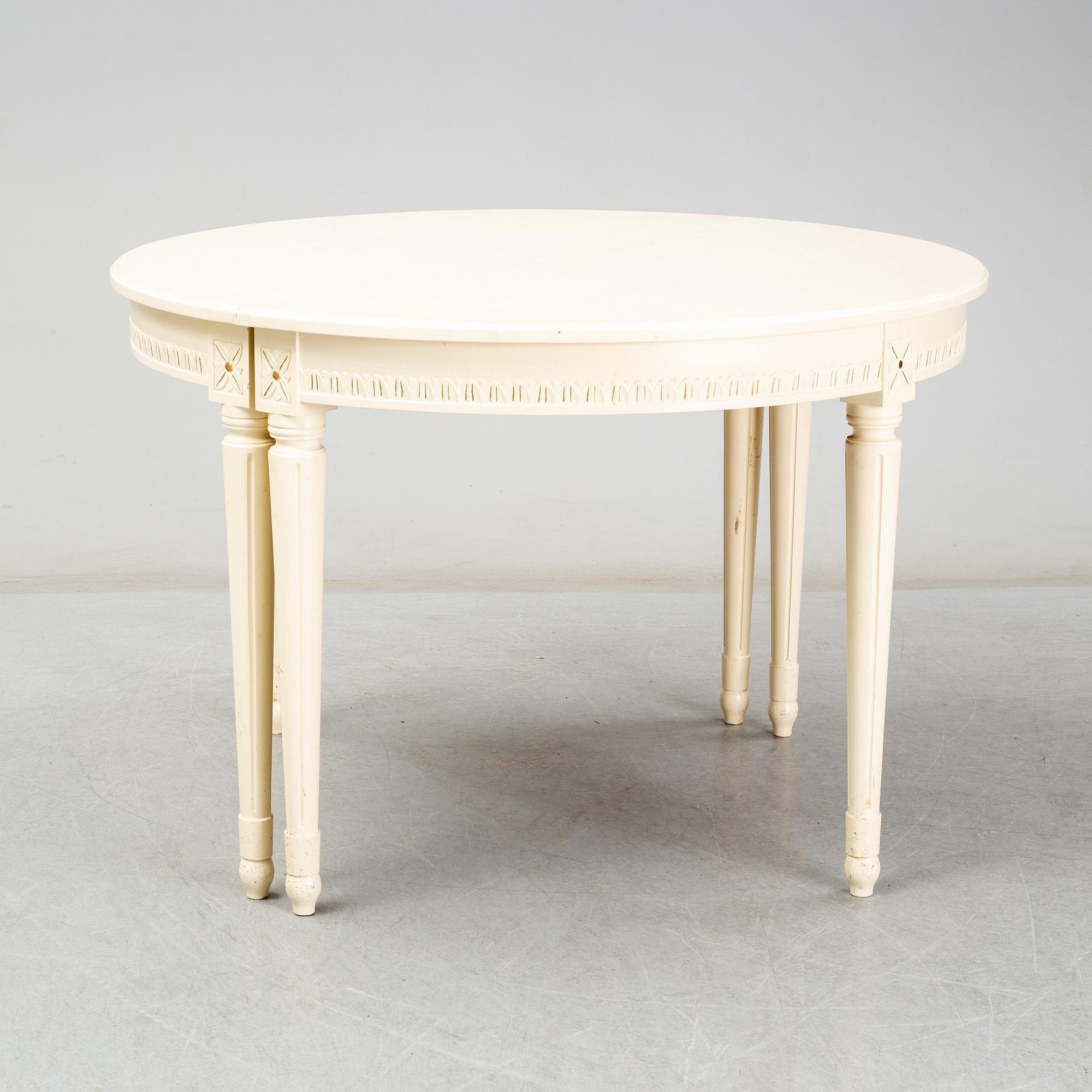 A Gustavian style dining table, second half of the 20th century. 3 leaves included.