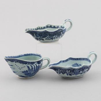 A group of three Chinese blue and white sauce boats, Qing dynsty, Qianlong (1736-95).