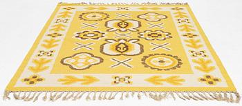 A flat weave rug, approx. 248 x 164 cm.