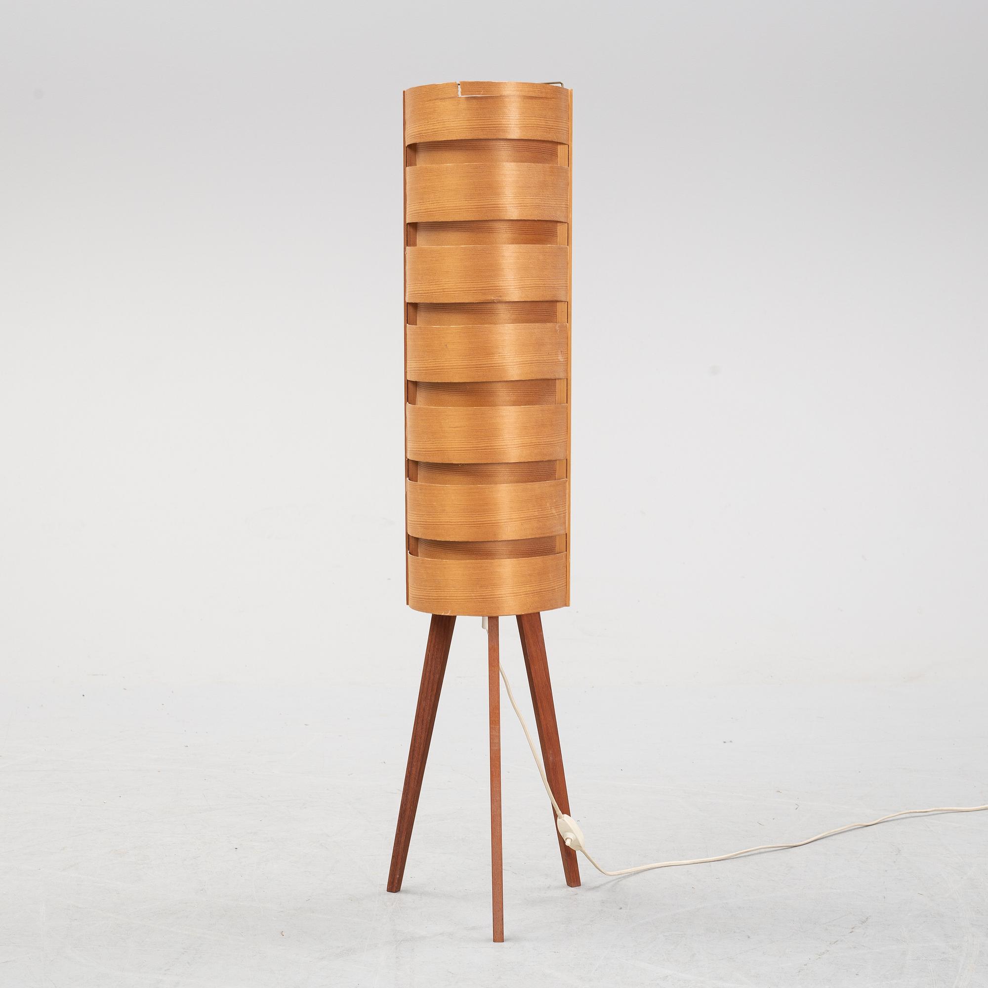Hans-Agne Jakobsson, a pine and teak floor light from Ellysett.