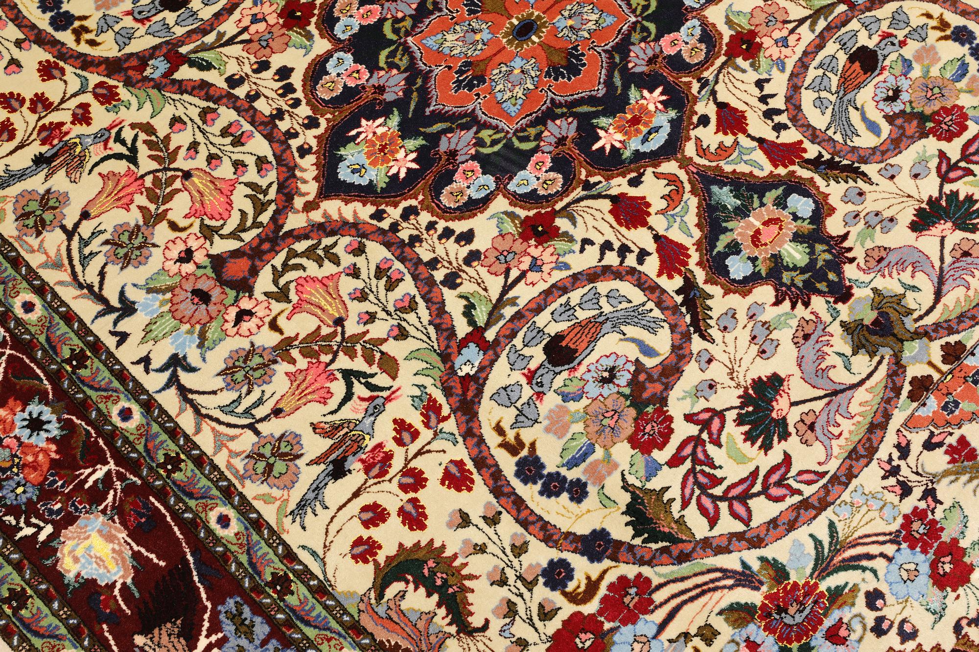 A part silk Tabriz rug, so-called 50 Raj, approx. 242 x 178 cm.