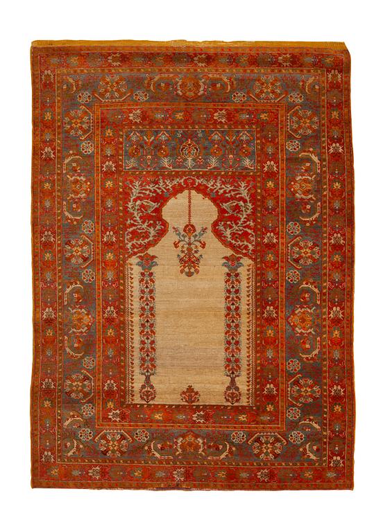 A rug, anique Anatolian, probably  Gördes (Ghiordes), ca 157 x 120 cm.